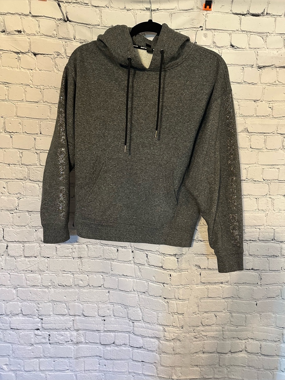 Dkny Gray Pullover Hoodie with Subtle Metallic Sleeve Detail